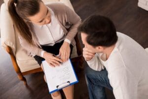 Nice positive psychologist interacting with the patient