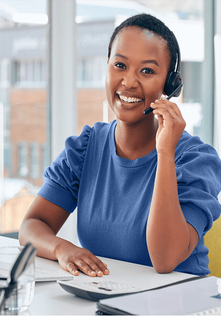 woman with headset smiling