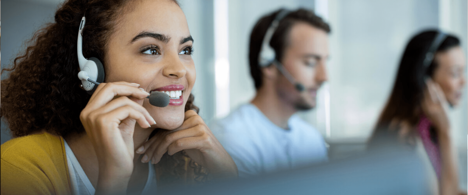 woman talking on phone with headset