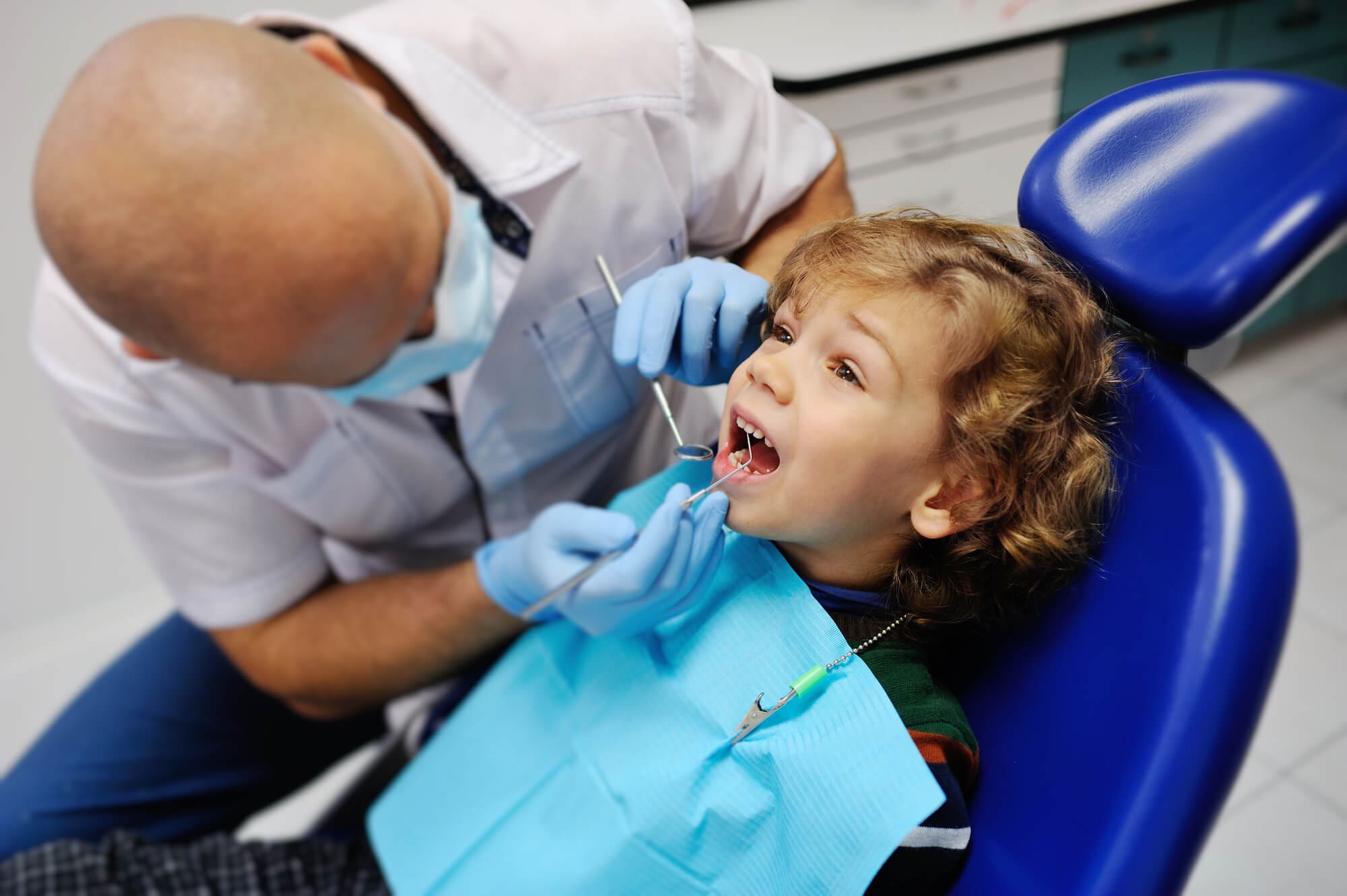 Patient consulting with dentists